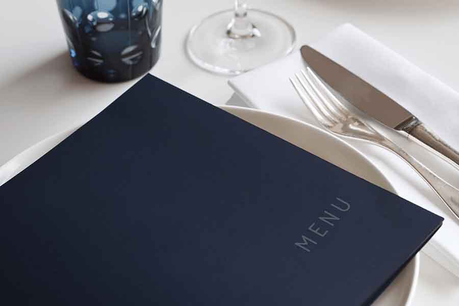 Restaurant menu on the table.