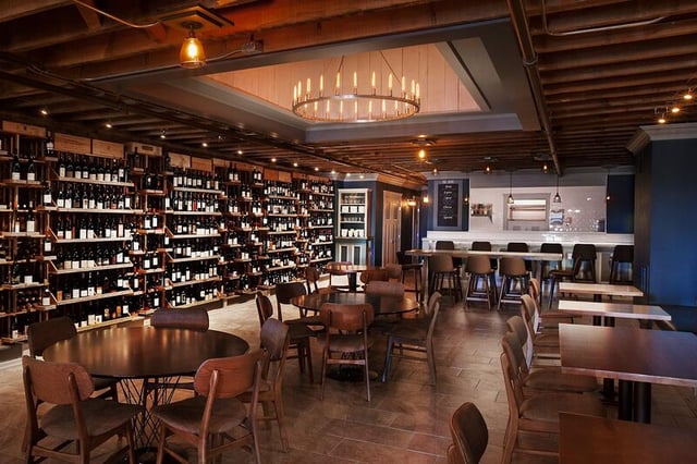 chandelier hanging from bar ceiling