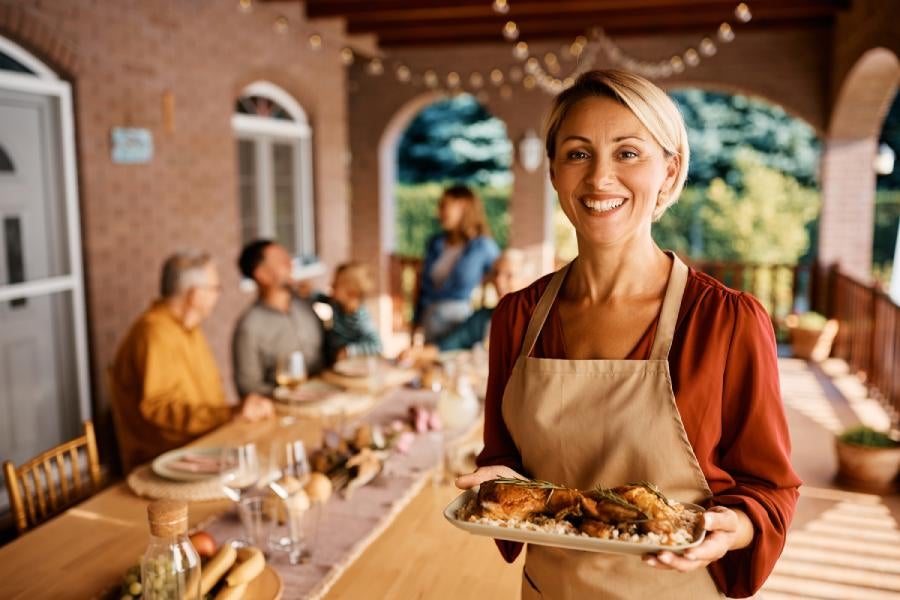 A happy caterer ready to serve.