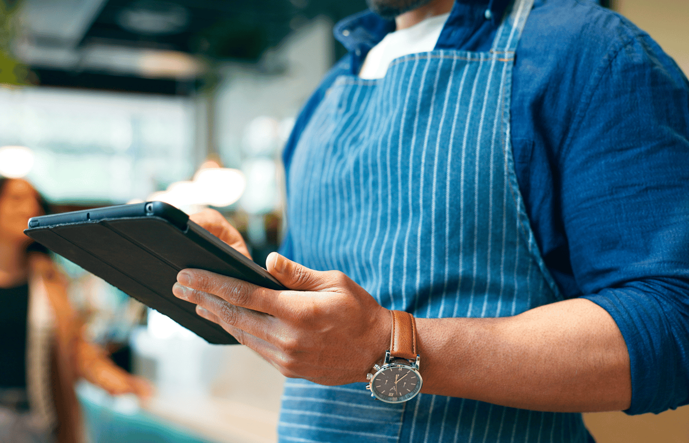Business owner, hands and tablet for cafe or restaurant marketing, online management and customer